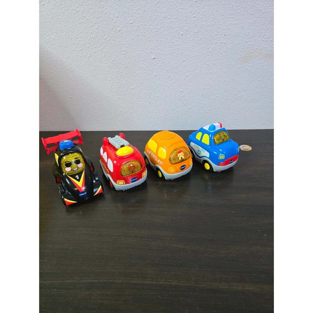 VTech Go Go Smart Wheels Toy Car Lot Race Car Fire Truck Van Police Car 4 Pack